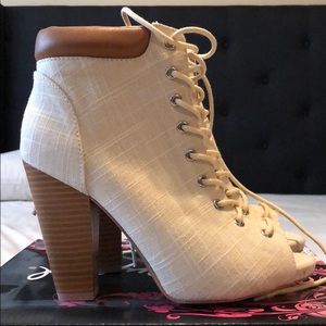 Brand new in box. Qupid Bailey open toe boots